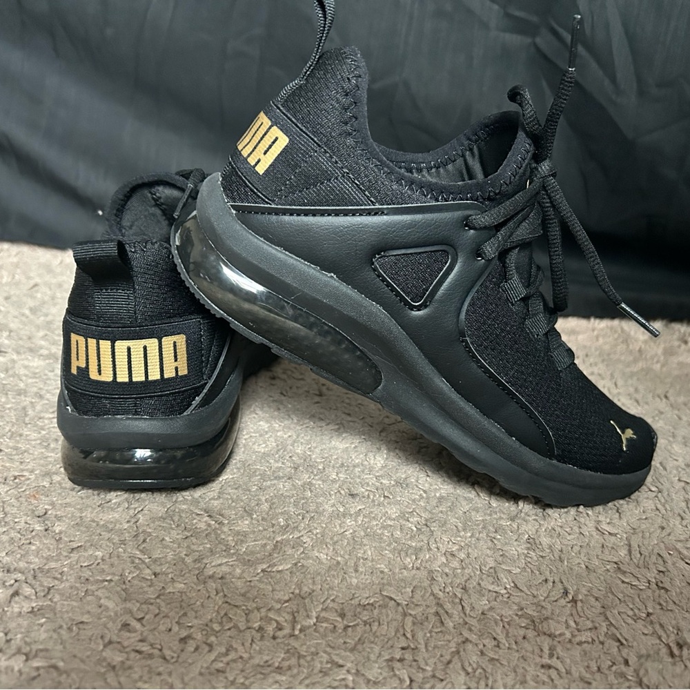 Puma Black Sneakers with Gold Logo